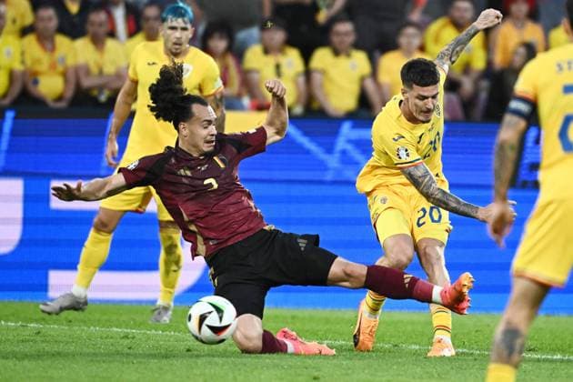 240622 EURO2024 BELGIUM VS ROMANIA Arthur Theate (3) of Belgium battles for the ball with Dennis Man (20) of Romania during a soccer game between the national teams of Belgium, called the Red Devils and Romania on the second matchday in Group E in the group stage of the UEFA EURO, EM, Europameisterschaft,Fussball 2024 tournament , on Saturday 22 June 2024 in Cologne , Germany . PHOTO Isosport Maarten Straetemans Cologne GERMANY  Copyright: xx 466920