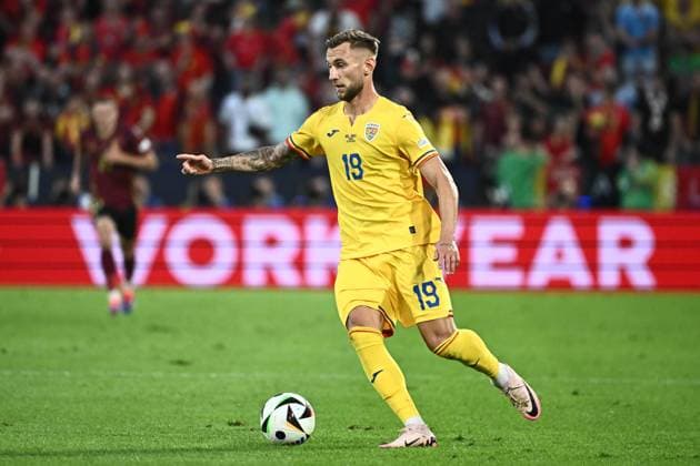 240622 EURO2024 BELGIUM VS ROMANIA Denis DraguÅü (19) of Romania pictured in action with the ball during a soccer game between the national teams of Belgium, called the Red Devils and Romania on the second matchday in Group E in the group stage of the UEFA EURO, EM, Europameisterschaft,Fussball 2024 tournament , on Saturday 22 June 2024 in Cologne , Germany . PHOTO Isosport Maarten Straetemans Cologne GERMANY  Copyright: xx 466924