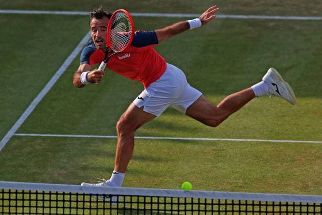 22nd June 2024; Cinch Championships, Queens Club, West Kensington, London, England: Cinch Championships Queens Club, Day 6; Ivan Dodig (CRO) in action during the mens doubles semifinal match against Neal Skupski (GBR) and Michael Venus (NZL)  ActionPlus12658840 ShaunxBrooks