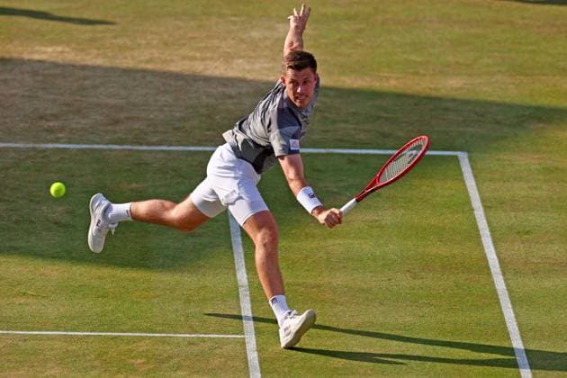 22nd June 2024; Cinch Championships, Queens Club, West Kensington, London, England: Cinch Championships Queens Club, Day 6; Neal Skupski (GBR) in action during the mens doubles semifinal match against Ivan Dodig (CRO) and Austin Krajicek (USA)  ActionPlus12658847 ShaunxBrooks