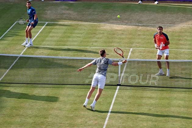22nd June 2024; Cinch Championships, Queens Club, West Kensington, London, England: Cinch Championships Queens Club, Day 6; Neal Skupski (GBR) and Michael Venus (NZL) compete during the mens doubles semifinal match against Ivan Dodig (CRO) and Austin Krajicek (USA)  ActionPlus12658854 ShaunxBrooks