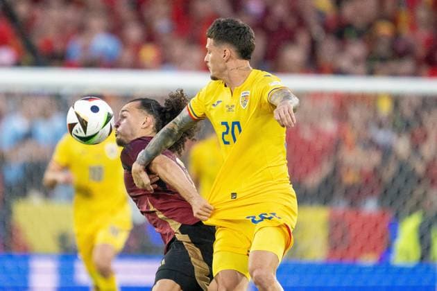 GER, EURO 2024, Group E, Belgium BEL vs Romania ROU 22 06 2024, Cologne Stadium, Cologne, GER, EURO 2024, Group E, Belgium BEL vs Romania ROU In the picture Artur Theate Belgium BEL, 03 Denis Man Romania ROU, 20 in duel, duel, dynamics, action, action, game scene gestures, facial expressions, emotions nordphotoxGmbHxx xDenkinger nph00015