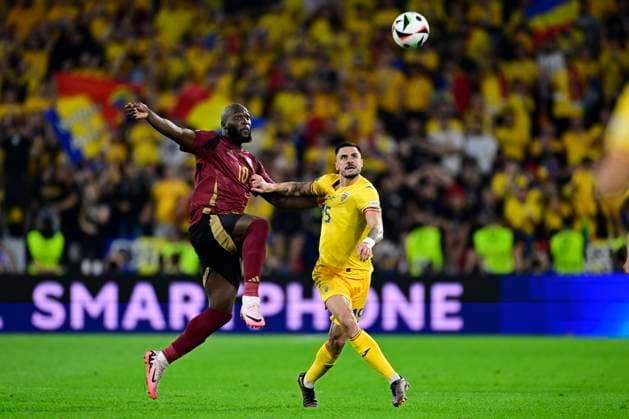 Belgium v Romania Group E - UEFA EURO, EM, Europameisterschaft,Fussball 2024 COLOGNE, GERMANY - JUNE 22 : Lukaku Romelu forward of Belgium battles for the ball with Andrei Burca defender of Romania during the UEFA EURO 2024 European Football Championship tournament group E stage match between Belgium and Romania at Cologne Stadium on June 22, 2024 in Cologne, Germany, 22 06 2024 Cologne Germany  Copyright: xPeterxDexVoechtx