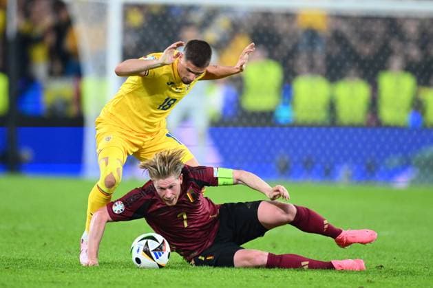 Belgium v Romania Group E - UEFA EURO, EM, Europameisterschaft,Fussball 2024 COLOGNE, GERMANY - JUNE 22 : De Bruyne Kevin forward of Belgium is challenged by Razvan Marin midfielder of Romania during the UEFA EURO 2024 European Football Championship tournament group E stage match between Belgium and Romania at Cologne Stadium on June 22, 2024 in Cologne, Germany, 22 06 2024 Cologne Germany  Copyright: xVincentxKalutx