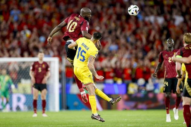 COLOGNE, RheinEnergieStadium , 22-06-2024 , European Football Championship Euro2024, Group stage match no.22 between Belgium and Romania. Belgium player Romelu Lukaku and Romania player Andonie Andrei Burca Belgium - Romania (Euro2024)  x25568331x Copyright: