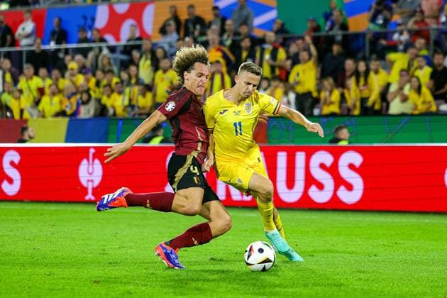 Belgium v Romania Euro 2024 22 06 2024. Group E Wout Faes of Belgium tackles Nicusor Bancu of Romania during the Euro 2024 match between Belgium and Romania at Cologne Stadium, Cologne, Germany on 22 June 2024. Editorial use only , Copyright: xNigelxKeenex PSI-19822-0024