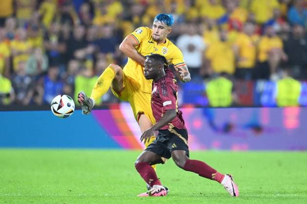 Belgium v Romania Group E - UEFA EURO, EM, Europameisterschaft,Fussball 2024 COLOGNE, GERMANY - JUNE 22 : Doku Jeremy forward of Belgium in duel with Andrei Ratiu defender of Romania during the UEFA EURO 2024 European Football Championship tournament group E stage match between Belgium and Romania at Cologne Stadium on June 22, 2024 in Cologne, Germany, 22 06 2024 Cologne Germany  Copyright: xVincentxKalutx