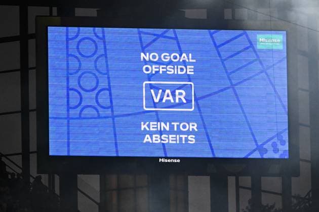 A VAR goal check is seen on the screen during a soccer game between Belgian national soccer team Red Devils and Romania, Saturday 22 June 2024 in Cologne, Germany, the second match in the group stage of the UEFA EURO, EM, Europameisterschaft,Fussball 2024 European championships. DIRKxWAEM  x95084574x