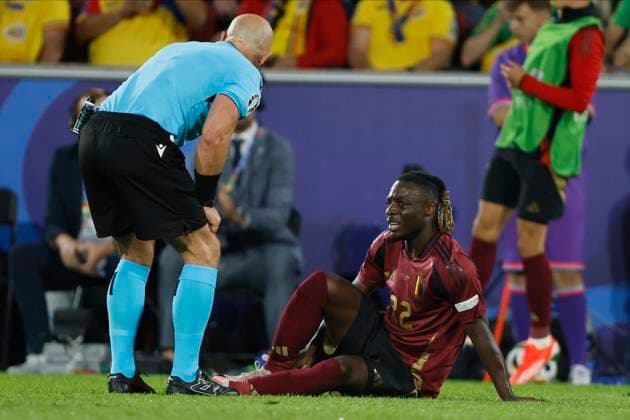 Belgium v Romania: Group E - UEFA EURO, EM, Europameisterschaft,Fussball 2024 Referee Szymon Marciniak checks on Jeremy Doku of Belgium during the UEFA EURO 2024 group stage match between Belgium and Romania at Cologne Stadium on June 22, 2024 in Cologne, Germany. Cologne Cologne Stadium Germany Germany Copyright: xRichardxSellers Sportsphoto APLx 14042184