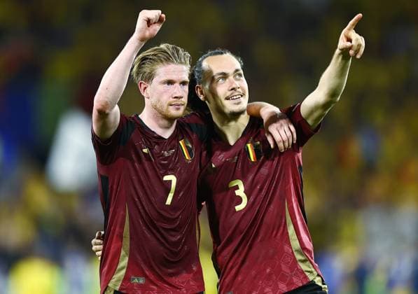 Kevin De Bruyne of Belgium celebrates with Arthur Theate at the end of the match Belgium v Romania, UEFA European Championship, EM, Europameisterschaft 2024, Group E, Football, Cologne Stadium, Cologne, Germany, 22 Jun 2024 EDITORIAL USE ONLY No use with unauthorised audio, video, data, fixture lists, club league logos or live services. Online in-match use limited to 120 images, no video emulation. No use in betting, games or single club league player publications. Copyright: xMichaelxZemanek Shutterstockx 14548045cr
