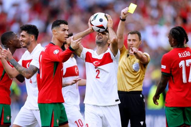 CELIK Zeki Team Turkey with RONALDO UEFA Football EURO 2024 in Germany Preliminary Round Match Group F Turkey Portugal 0 3 on 22 06 2024 in Dortmund DFL REGULATIONS PROHIBIT ANY USE OF PHOTOGRAPHS as IMAGE SEQUENCES and or QUASI VIDEO Copyright: xLacixPerenyix