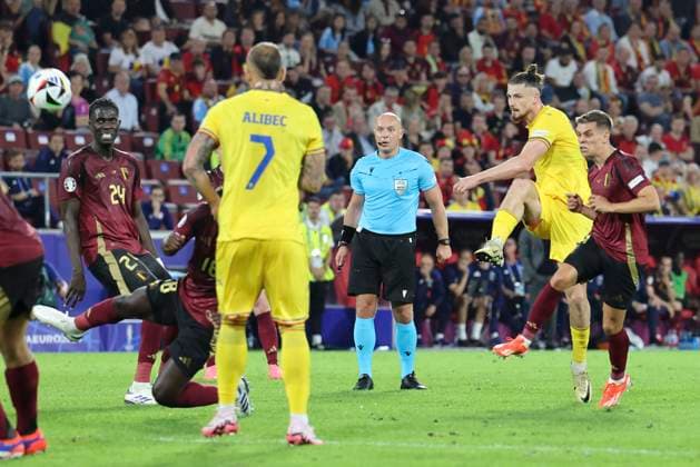 Belgium v Romania UEFA EURO, EM, Europameisterschaft,Fussball 2024 Group E Radu DrÄ?guÈ?in of Romania has a shot on goal during the UEFA Euro 2024 Group E match at RheinEnergieStadion, Cologne Copyright: xPaulxChestertonx FIL-20284-0208 UK Newspapers OUT
