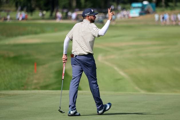 COLLEGE GROVE, TN - JUNE 22: John Catlin (USA) waves to the fans after a birdie putt on the 14th hole during the second round of LIV Golf Nashville on June 22, 2024 at the Grove Golf Course in College Grove, Tennessee. (Photo by Michael Wade Icon Sportswire) GOLF: JUN 22 LIV Golf League Nashville EDITORIAL USE ONLY Icon0622486