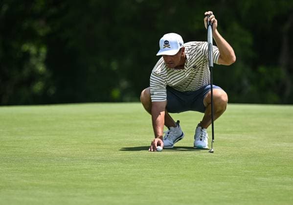 COLLEGE GROVE, TN - JUNE 22: Bryson DeChambeau (USA) of Crushers GC lines up his putt during the Nashville LIV Golf Tournament on June 22, 2024, at The Grove in College Grove, TN. (Photo by Bryan Lynn Icon Sportswire) GOLF: JUN 22 LIV Golf League Nashville EDITORIAL USE ONLY Icon240622017