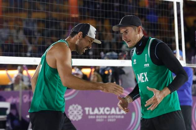 June 22, 2024, Tlaxcala, Ciudad de Mexico, Mexico: Juan Virgen 2 and Ricardo Galindo 1 of Team Mexico celebrating against Oscar Martinez 2 of Team RepoÂºblica Dominicana during the Men s quarter finals match of Norceca 2024 Beach volleyball, Beachvolleyball Olympic Qualification Tournament . Team Mexico defeats Team Republica Dominicana 2 sets to 1. on June 22, 2024 in Tlaxcala, Mexico. Tlaxcala Mexico - ZUMAe321 20240622_zsa_e321_127 Copyright: xEssenexHernandez xEyepixxGroupx
