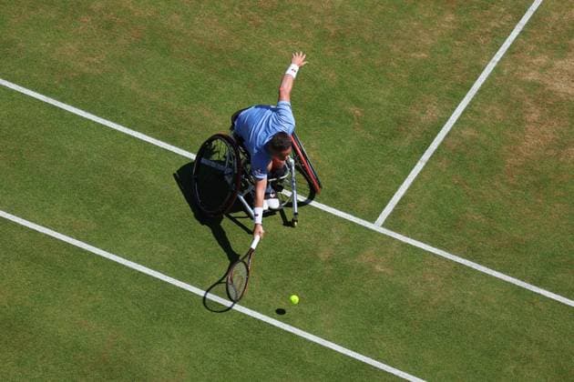 23rd June 2024; Cinch Championships, Queens Club, West Kensington, London, England: Cinch Championships Queens Club, Day 7; Alfie Hewett (GBR) with a forehand shot to Gordon Reid (GBR), mens wheelchair singles final match  ActionPlus12659083 JohnxPatrickxFletcher