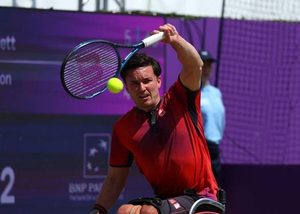 23rd June 2024; Cinch Championships, Queens Club, West Kensington, London, England: Cinch Championships Queens Club, Day 7; Gordon Reid (GBR) with a backhand shot to Alfie Hewett (GBR), mens wheelchair singles final match  ActionPlus12659094 JohnxPatrickxFletcher