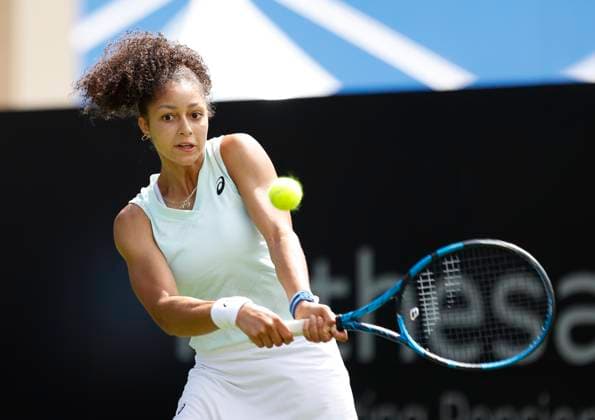 23rd June 2024; Devonshire Park, Eastbourne, East Sussex, England: Rothesay International Eastbourne, Qualifying Day 2, Ranah Akua Stoiber (GBR) plays a backhand against Magda Linette (POL) in their Qualification Final  ActionPlus12659233 HongboxChen