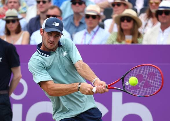 23rd June 2024; Cinch Championships, Queens Club, West Kensington, London, England: Cinch Championships Queens Club, Day 7; Tommy Paul (USA) with a backhand shot to Lorenzo Musetti (ITA), mens singles finals match  ActionPlus12659292 JohnxPatrickxFletcher