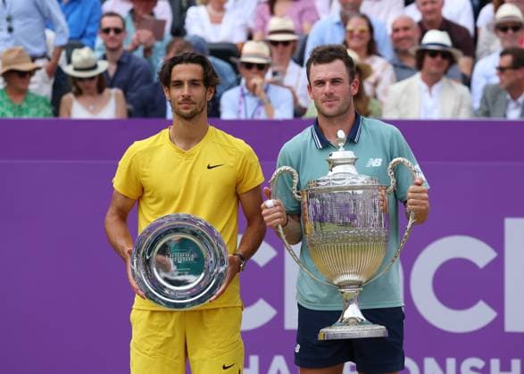 23rd June 2024; Cinch Championships, Queens Club, West Kensington, London, England: Cinch Championships Queens Club, Day 7, mens singles final; Tommy Paul (USA) poses with the Queens Club trophy alongside runner up Lorenzo Musetti (ITA)  ActionPlus12659304 JohnxPatrickxFletcher