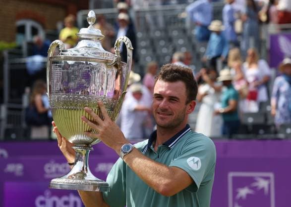 23rd June 2024; Cinch Championships, Queens Club, West Kensington, London, England: Cinch Championships Queens Club, Day 7 mens singles final; Tommy Paul (USA) lifts the Queens Club trophy after defeating Lorenzo Musetti (ITA) in two sets  ActionPlus12659308 JohnxPatrickxFletcher