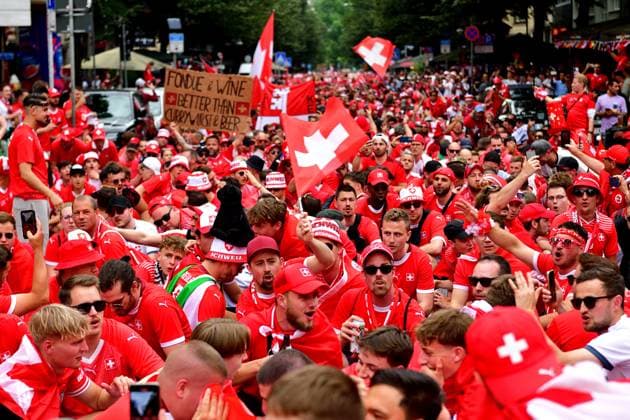 23 6 2024 Soccer fans Fans of the Swiss national team on their way through the Frankfurt train station district to the stadium to watch the match against Germany Frankfurt am Main Kaiserstrasse Hessen Germany 0625284071st