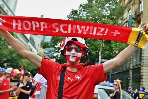 23 6 2024 Soccer fans Fans of the Swiss national team on their way through the Frankfurt train station district to the stadium to watch the match against Germany Frankfurt am Main Kaiserstrasse Hessen Germany 0625284081st