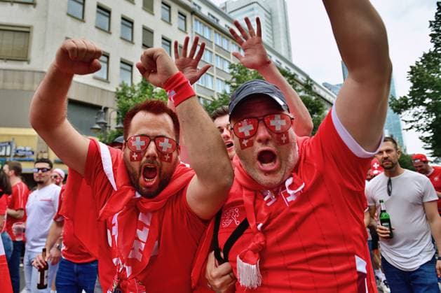 23 6 2024 Soccer fans Fans of the Swiss national team on their way through the Frankfurt train station district to the stadium to watch the match against Germany Frankfurt am Main Kaiserstrasse Hessen Germany 0625284087st