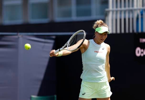 23rd June 2024; Devonshire Park, Eastbourne, East Sussex, England: Rothesay International Eastbourne, Qualifying Day 2, Viktorija Golubic (SUI) plays a backhand against Sofia Kenin (USA) in the Qualification Final  ActionPlus12659398 HongboxChen
