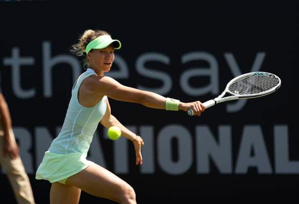23rd June 2024; Devonshire Park, Eastbourne, East Sussex, England: Rothesay International Eastbourne, Qualifying Day 2, Viktorija Golubic (SUI) plays a backhand against Sofia Kenin (USA) in the Qualification Final  ActionPlus12659401 HongboxChen