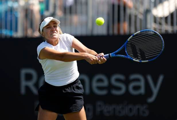 23rd June 2024; Devonshire Park, Eastbourne, East Sussex, England: Rothesay International Eastbourne, Qualifying Day 2, Sofia Kenin (USA) plays a backhand against Viktorija Golubic (SUI) in the Qualification Final  ActionPlus12659402 HongboxChen