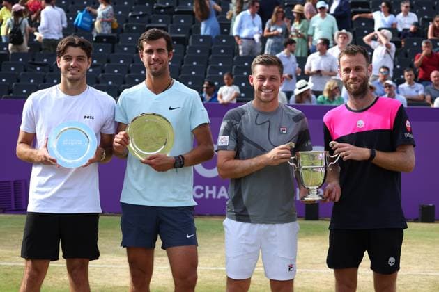 23rd June 2024; Cinch Championships, Queens Club, West Kensington, London, England: Cinch Championships Queens Club, Day 7; Neal Skupski (GBR) and doubles partner Michael Venus (NZL) pose with the mens doubles trophy alongside runners up Taylor Fritz (USA) and Karen Khachanov (RUS), mens doubles final match  ActionPlus12659429 JohnxPatrickxFletcher