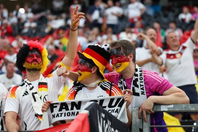 Germany fans, soccer, national team, EM 2024, Germany, group stage, fans, enthusiasm, German flags, fan outfits, costumes, hats, fan accessories, cheering, joy, stadium atmosphere, sporting event, outdoor, lettering, banner, black red gold, mood, Anticipation, fan articles, German national team, stadium, fan chants, soccer fever, emotions, football, UEFA, European Championship, Group A 2024, Switzerland vs Germany, 23 06 2024, Frankfurt Arena, Frankfurt, Germany Frankfurt Frankfurt Arena Hessen Germany Copyright: xGrantxHubbsx
