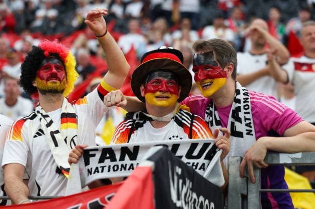Germany fans, soccer, national team, EM 2024, Germany, group stage, fans, enthusiasm, German flags, fan outfits, costumes, hats, fan accessories, cheering, joy, stadium atmosphere, sporting event, outdoor, lettering, banner, black red gold, mood, Anticipation, fan articles, German national team, stadium, fan chants, soccer fever, emotions, football, UEFA, European Championship, Group A 2024, Switzerland vs Germany, 23 06 2024, Frankfurt Arena, Frankfurt, Germany Frankfurt Frankfurt Arena Hessen Germany Copyright: xGrantxHubbsx