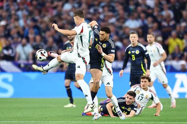 Willi Orban of Hungary and ChÃ Adams of Scotland Scotland v Hungary, UEFA European Championship, EM, Europameisterschaft 2024, Group A, Football, Stuttgart Arena, Stuttgart, Germany, 23 Jun 2024 EDITORIAL USE ONLY No use with unauthorised audio, video, data, fixture lists, club league logos or live services. Online in-match use limited to 120 images, no video emulation. No use in betting, games or single club league player publications.  Copyright: xMichaelxZemanek Shutterstockx 14548075n