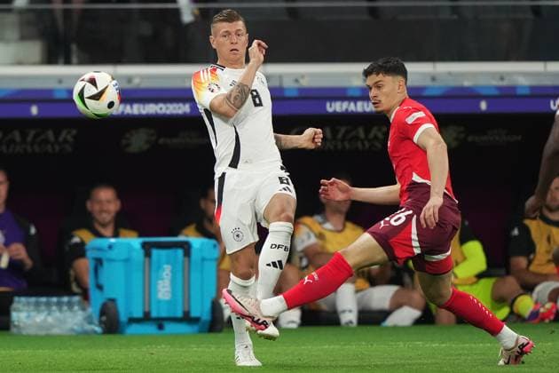 Germany s Toni Kroos fight for the ball with Switzerland s Fabian Rieder during the Euro 2024 soccer match between Switzerland and Germany at the Frankfurt Arena , Frankfurt , Germany - Sunday 23 June 2024. - Soccer .  Copyright: xSpada LaPressex