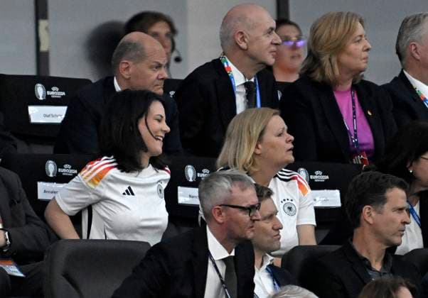 23 06 2024, Football UEFA EURO 2024, preliminary round, match day 3, Germany Switzerland, in the Frankfurt Arena in Frankfurt am Main, Federal Chancellor Olaf Scholz Germany and Foreign Minister Annalena Baerbock Germany with Germany jersey and Nancy Fässer Germany