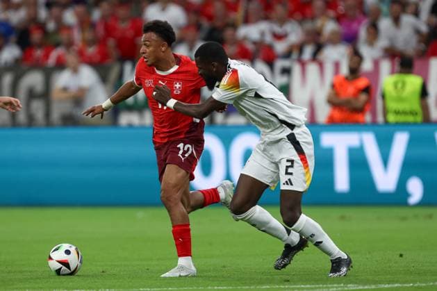 Dan Ndoye Switzerland and Antonio Rüdiger Germany in a duel, UEFA EURO 2024 Group A, Switzerland vs Germany, Arena Frankfurt on June 23, 2024 in Frankfurt am Main, Germany Photo by Oliver Kaelke DeFodi Images Dan Ndoye Switzerland and Antonio Rüdiger Germany battle for the ball, UEFA EURO 2024 Group A, Switzerland vs Germany, Arena Frankfurt on June 23, 2024 in Frankfurt am Main, Germany Photo by Oliver Kaelke DeFodi Images Defodi 678 2024 06 23 OK SUIGER 0742 Defodi-678