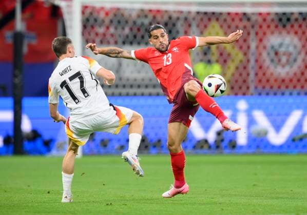 v l Florian WIRTZ GER , RODRIGUEZ Ricardo SUI Action, duel, preliminary round 3 match day, group A, match M25, Switzerland SUI Germany GER , on 23 06 2024 in Frankfurt Germany European Football Championship 2024 from 14 06 14 07 2024 in Germany Â