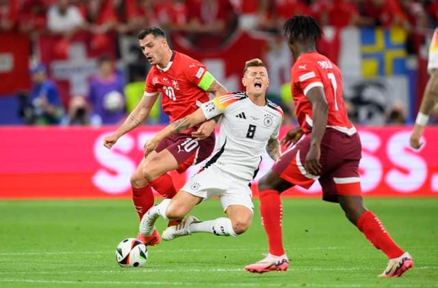 v l XHAKA Granit SUI , Toni KROOS GER foul, action, duel, preliminary round 3 match day, group A, match M25, Switzerland SUI Germany GER , on 23 06 2024 in Frankfurt Germany European Football Championship 2024 from 14 06 14 07 2024 in Germany Â
