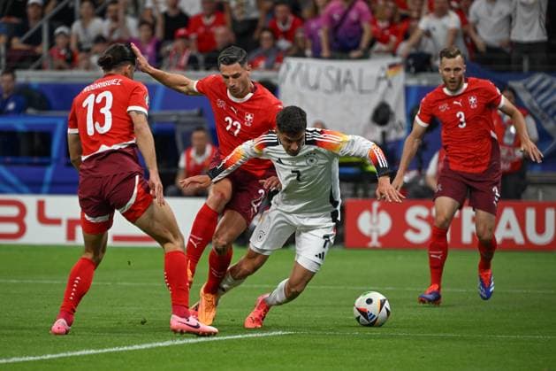 23 06 2024, xjhx, European Football Championship 2024, Switzerland Germany emspor, v l Ricardo Rodriguez Switzerland, 13 , Fabian Schaer Switzerland, 22 , Kai Havertz Germany, 7 duel, duel, fight, tackle UEFA REGULATES PROHIBIT ANY USE OF PHOTOGRAPHS as IMAGE SEQUENCES and or QUASI VIDEO Frankfurt