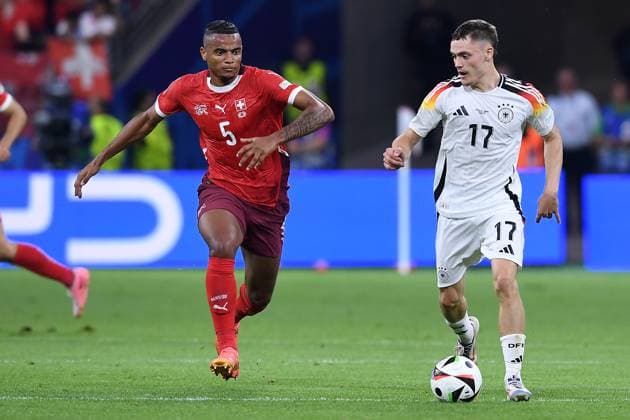 Soccer UEFA EURO 2024 Group Stage 3 Matchday Switzerland Germany on 23 06 2024 at the Frankfurt Arena in Frankfurt Manuel Akanji Switzerland , left Florian Wirtz Germany , right xRx