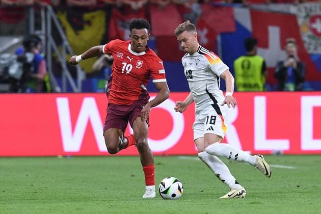 Soccer UEFA EURO 2024 group stage 3 matchday Switzerland Germany on 23 06 2024 at the Frankfurt Arena in Frankfurt Dan Ndoye Switzerland , left Maximilian Mittelstädt Germany , right xRx