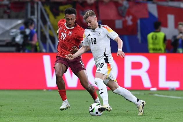 Soccer UEFA EURO 2024 group stage 3 matchday Switzerland Germany on 23 06 2024 at the Frankfurt Arena in Frankfurt Dan Ndoye Switzerland , left Maximilian Mittelstädt Germany , right xRx