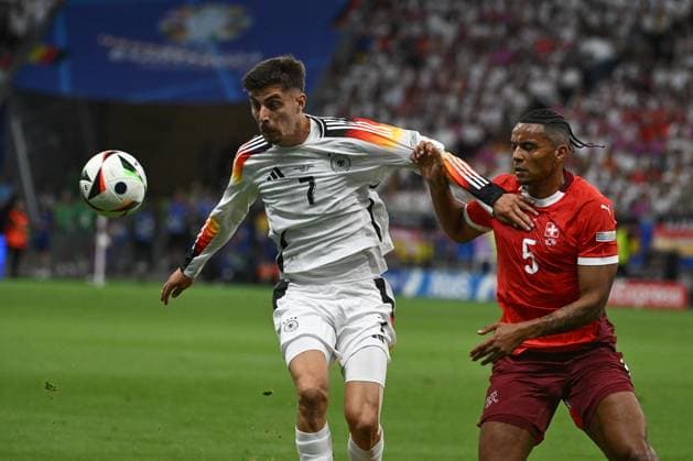 23 06 2024, xpsx, Football EM 2024, Switzerland Germany emspor, v l Kai Havertz Germany, 7 , Manuel Akanji Switzerland, 5 duel, fight, tackle DFL DFB REGULATIONS PROHIBIT ANY USE OF PHOTOGRAPHS as IMAGE SEQUENCES and or QUASI VIDEO Frankfurt