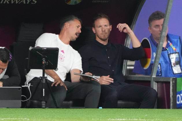 Co-coach assistant coach Sandro Wagner Germany Germany and national coach Julian Nagelsmann Germany Germany discuss tactics with their booklet Frankfurt 23 06 2024 Germany vs Switzerland, EURO2024 M25, Group A, EM Arena Frankfurt