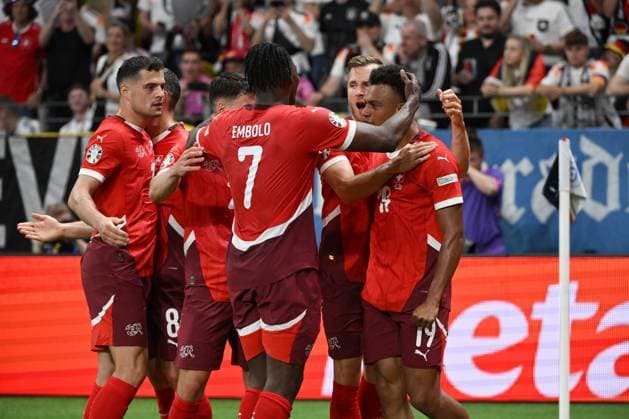 The Swiss players celebrate the 1 0 of Dan Ndoye Switzerland , right , left Granit Xhaka Switzerland 23 06 2024, European Football Championship 2024, preliminary round, matchday 3 Switzerland Germany Frankfurt Frankfurt Arena Hessen Germany Team2