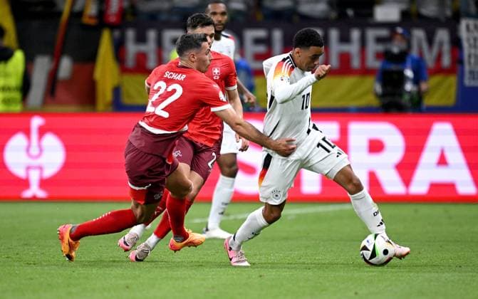 Football Euro 2024 Group A 23 06 2024 Switzerland Germany Fabian Schaer left, Switzerland v Jamal Musiala right, Germany