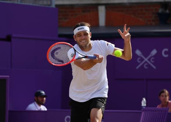 23rd June 2024; Cinch Championships, Queens Club, West Kensington, London, England: Cinch Championships Queens Club, Day 7; Taylor Fritz (USA) with a forehand shot to Neal Skupski (GBR), mens doubles final  ActionPlus12659561 JohnxPatrickxFletcher