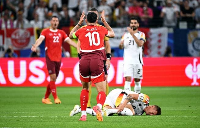 Football, European Championship, EURO 2024, Group A, Frankfurt Arena Switzerland Germany Granit Xhaka SUI complains about the referees decision